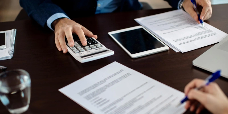 Calculator and documents used to estimate real estate referral income and referral fees